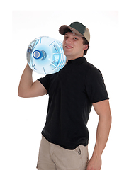 Image showing Close up of a deliveries man with water bottle