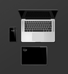 Image showing Laptop, tablet and phone set mockup isolated on black. 3D render