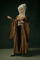 Image showing Medieval young woman in old-fashioned costume