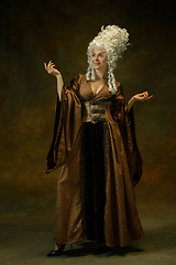 Image showing Medieval young woman in old-fashioned costume