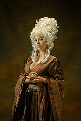 Image showing Medieval young woman in old-fashioned costume