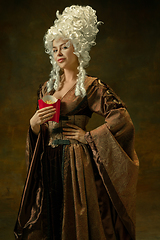 Image showing Medieval young woman in old-fashioned costume