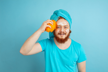 Image showing Portrait of young caucasian man in his beauty day and skin care routine