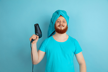 Image showing Portrait of young caucasian man in his beauty day and skin care routine