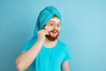 Image showing Portrait of young caucasian man in his beauty day and skin care routine