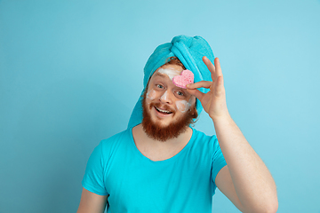 Image showing Portrait of young caucasian man in his beauty day and skin care routine