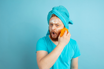 Image showing Portrait of young caucasian man in his beauty day and skin care routine