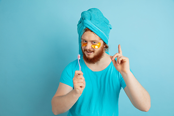 Image showing Portrait of young caucasian man in his beauty day and skin care routine