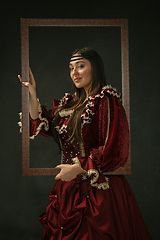 Image showing Medieval young woman in old-fashioned costume