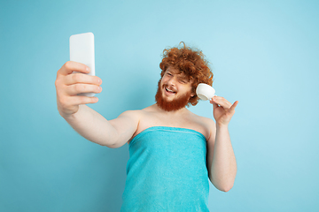 Image showing Portrait of young caucasian man in his beauty day and skin care routine