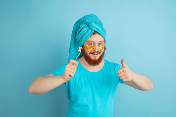 Image showing Portrait of young caucasian man in his beauty day and skin care routine