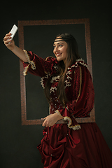 Image showing Medieval young woman in old-fashioned costume