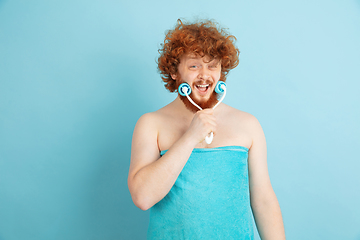 Image showing Portrait of young caucasian man in his beauty day and skin care routine