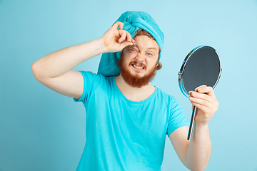 Image showing Portrait of young caucasian man in his beauty day and skin care routine