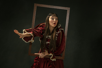 Image showing Medieval young woman in old-fashioned costume