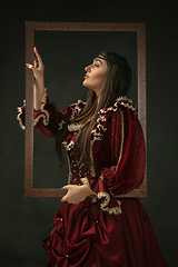 Image showing Medieval young woman in old-fashioned costume