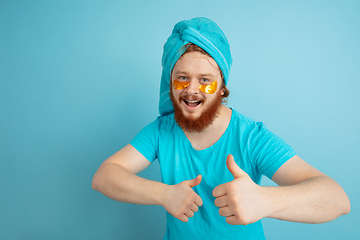 Image showing Portrait of young caucasian man in his beauty day and skin care routine