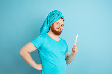 Image showing Portrait of young caucasian man in his beauty day and skin care routine