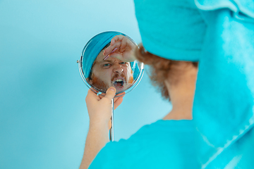 Image showing Portrait of young caucasian man in his beauty day and skin care routine