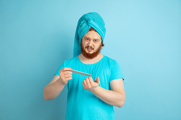 Image showing Portrait of young caucasian man in his beauty day and skin care routine