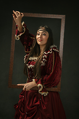 Image showing Medieval young woman in old-fashioned costume