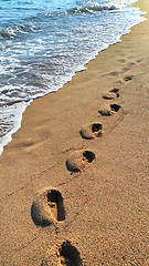 Image showing Footprints on the sandy beach