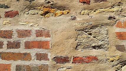 Image showing Very ancient wall with stones and bricks