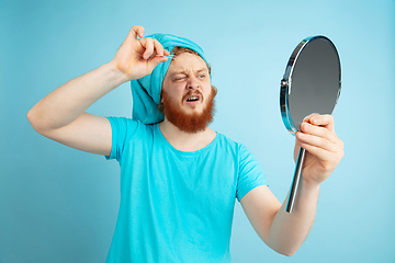 Image showing Portrait of young caucasian man in his beauty day and skin care routine