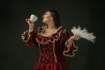 Image showing Medieval young woman in old-fashioned costume