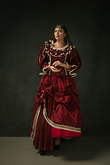 Image showing Medieval young woman in old-fashioned costume