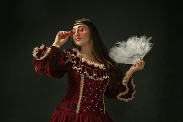 Image showing Medieval young woman in old-fashioned costume