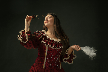 Image showing Medieval young woman in old-fashioned costume