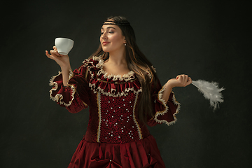 Image showing Medieval young woman in old-fashioned costume