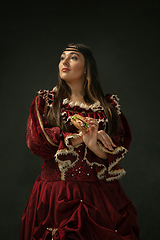 Image showing Medieval young woman in old-fashioned costume