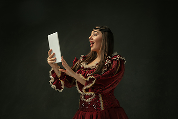 Image showing Medieval young woman in old-fashioned costume