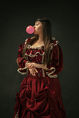 Image showing Medieval young woman in old-fashioned costume