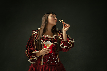 Image showing Medieval young woman in old-fashioned costume