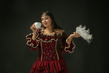 Image showing Medieval young woman in old-fashioned costume