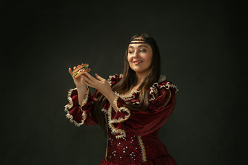 Image showing Medieval young woman in old-fashioned costume