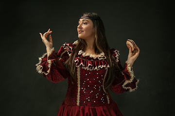 Image showing Medieval young woman in old-fashioned costume