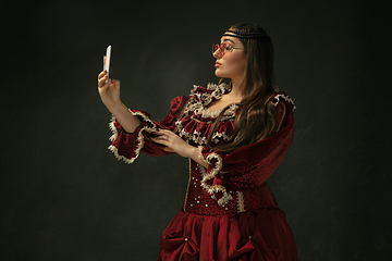 Image showing Medieval young woman in old-fashioned costume