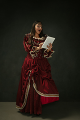 Image showing Medieval young woman in old-fashioned costume