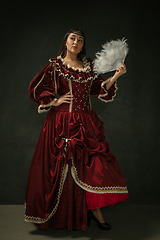 Image showing Medieval young woman in old-fashioned costume