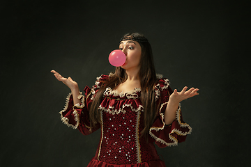 Image showing Medieval young woman in old-fashioned costume