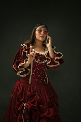 Image showing Medieval young woman in old-fashioned costume