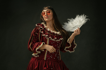 Image showing Medieval young woman in old-fashioned costume