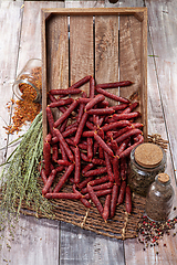 Image showing Sausages On A Wooden Table