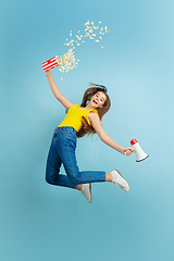 Image showing Caucasian teen girl portrait isolated on blue studio background