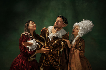 Image showing Medieval young man and women in old-fashioned costume