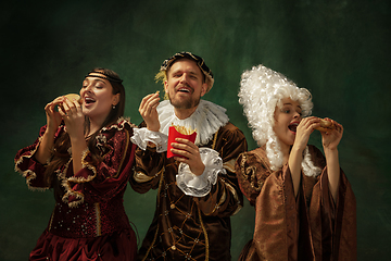 Image showing Medieval young man and women in old-fashioned costume